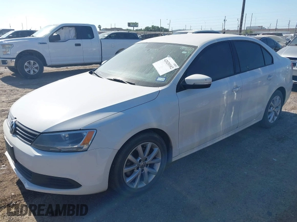 2012 Volkswagen Jetta Sedan SE w/Convenience with VIN 3VWDX7AJ2CM309397, listed as a IAAI auction lot 42020102 with 1 mi miles. Bid and sale history available at carsss.com. Image 2.