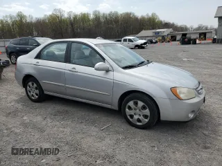 2004 Kia Spectra LX with VIN KNAFE121245031019, listed as a Copart auction lot 52960135 with 183,016 mi miles and Salvage Title. Bid and sale history available at carsss.com. Image 4.