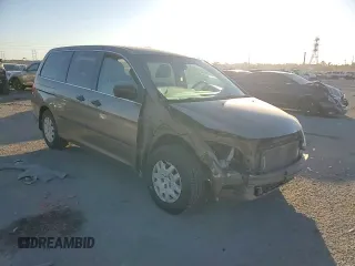 2009 Honda Odyssey LX с VIN 5FNRL38279B025918, выставлен на аукционе Copart как лот 82848404 с пробегом 71 791 миль миль и Списание • Salvage title. История ставок и продаж доступна на DreamBid. Изображение 12.
