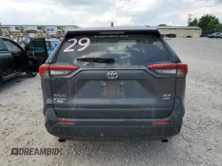 2019 Toyota RAV4 XLE with VIN JTMP1RFV8KD013125, listed as a Copart auction lot 59328465 with 106,947 mi miles and Salvage title. Bid and sale history available at DreamBid. Image 6.