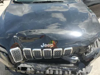 2019 Jeep Cherokee Latitude z VIN 1C4PJMCB8KD212964, wystawiony jako Copart lot #56205015 z przebiegiem 116 443 mil mil oraz Szkoda całkowita • Salvage title. Historia ofert i sprzedaży dostępna na DreamBid. Obrazek 12.
