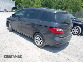 2015 Mazda 5 Sport with VIN JM1CW2BL7F0183114, listed as a IAAI auction lot 42409805 with 174,606 mi miles and . Bid and sale history available at DreamBid. Image 3.
