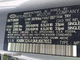 2021 Hyundai Kona SE with VIN KM8K12AA9MU667653, listed as a IAAI auction lot 41889973 with 30,399 mi miles and . Bid and sale history available at DreamBid. Image 9.