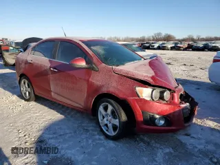 2014 Chevrolet Sonic LTZ with VIN 1G1JE5SB0E4229661, listed as a Copart auction lot 41872355 with 0 mi miles and Salvage Title. Bid and sale history available at carsss.com. Image 4.