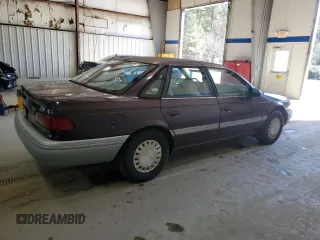 1992 Ford Taurus z VIN 1FACP50U4NA144506, wystawiony jako Copart lot #80000064 z przebiegiem 40 600 mil mil oraz Czysty tytuł • Clean title. Historia ofert i sprzedaży dostępna na DreamBid. Obrazek 3.