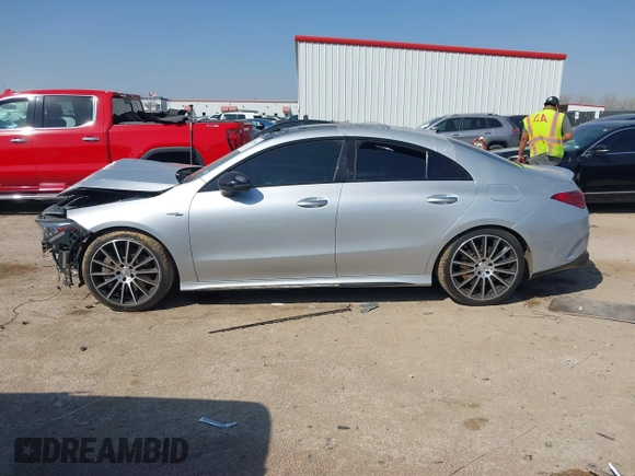 2021 Mercedes-Benz CLA 35 AMG with VIN W1K5J5BB3MN211075, listed as a IAAI auction lot 41789306 with 76,885 mi miles and . Bid and sale history available at DreamBid. Image 14.