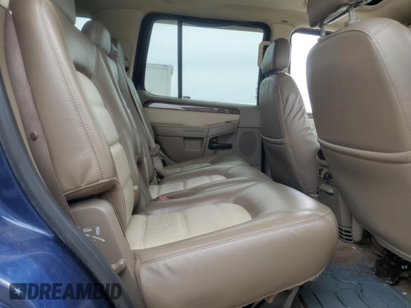 2004 Ford Explorer Eddie Bauer with VIN 1FMDU74W64UB74730, listed as a Copart auction lot 58534535 with 167,112 mi miles and Salvage title. Bid and sale history available at DreamBid. Image 11.