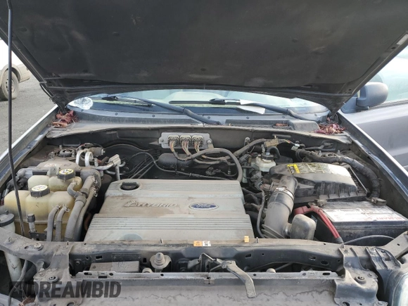2007 Mercury Mariner with VIN 4M2CU39H07KJ17372, listed as a Copart auction lot 77906304 with 194,603 mi miles and Salvage Title. Bid and sale history available at carsss.com. Image 12.