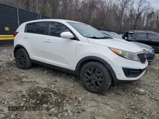 2015 Kia Sportage LX with VIN KNDPBCACXF7682520, listed as a Copart auction lot 51099855 with 202,655 mi miles and Salvage Title. Bid and sale history available at carsss.com. Image 4.