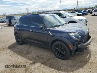 2016 MINI Countryman S with VIN WMWZC3C59GWT08439, listed as a Copart auction lot 65167955 with 76,336 mi miles and Salvage title. Bid and sale history available at DreamBid. Image 4.