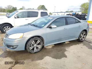 2009 Pontiac G6 1SB with VIN 1G2ZJ57KX94241535, listed as a Copart auction lot 50778395 with 114,992 mi miles and Salvage title. Bid and sale history available at DreamBid. Image 1.