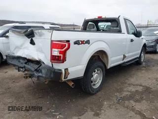 2018 Ford F-150 XL with VIN 1FTNF1E53JKC23766, listed as a IAAI auction lot 41149145 with 301,176 mi miles and . Bid and sale history available at DreamBid. Image 4.