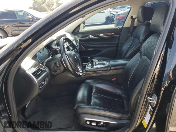 2016 BMW 7 Series 740i with VIN WBA7E2C59GG547804, listed as a Copart auction lot 68620463 with 122,937 mi miles. Bid and sale history available at carsss.com. Image 7.