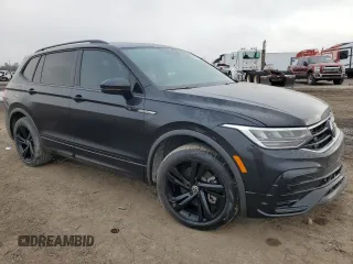 2023 Volkswagen Tiguan SE R-Line Black with VIN 3VVCB7AX8PM016614, listed as a Copart auction lot 43944695 with 39,378 mi miles and Salvage title. Bid and sale history available at DreamBid. Image 4.