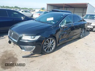 2018 Lincoln MKZ Select z VIN 3LN6L5C90JR625598, wystawiony jako IAAI lot #42189498 z przebiegiem 98 803 mil mil oraz . Historia ofert i sprzedaży dostępna na DreamBid. Obrazek 2.