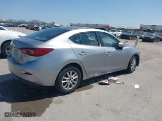 2016 Mazda Mazda3 i Sport with VIN JM1BM1U74G1280293, listed as a IAAI auction lot 41925632 with 119,679 mi miles. Bid and sale history available at carsss.com. Image 4.