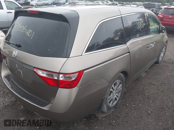 2011 Honda Odyssey EX-L with VIN 5FNRL5H68BB054204, listed as a IAAI auction lot 42576248 with Not provided miles and . Bid and sale history available at DreamBid. Image 4.
