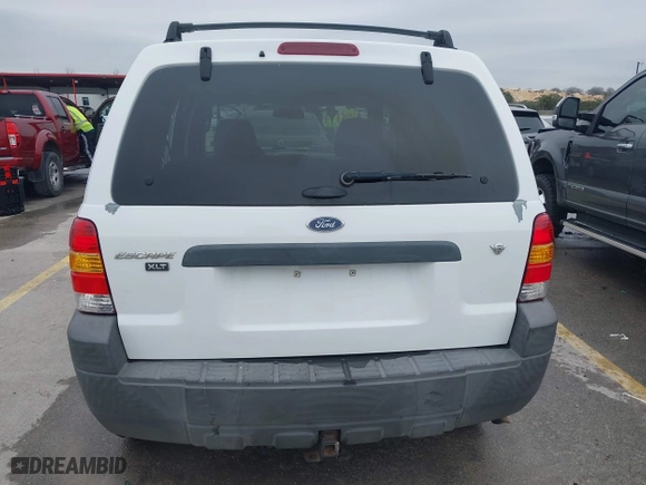 2007 Ford Escape XLT with VIN 1FMYU93147KA42293, listed as a IAAI auction lot 41586591 with 215,643 mi miles. Bid and sale history available at carsss.com. Image 16.