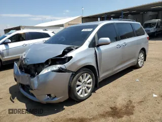 2017 Toyota Sienna XLE with VIN 5TDDZ3DC3HS177700, listed as a Copart auction lot 59720215 with 124,180 mi miles and Salvage title. Bid and sale history available at DreamBid. Image 1.