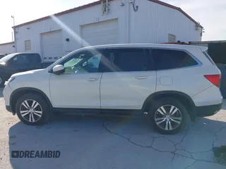 2016 Honda Pilot EX-L with VIN 5FNYF5H5XGB016152, listed as a IAAI auction lot 41820023 with 210,474 mi miles and . Bid and sale history available at DreamBid. Image 15.