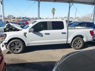 2024 Ford F-150 STX with VIN 1FTEW2KP7RFA29709, listed as a IAAI auction lot 41311395 with 5,883 mi miles and . Bid and sale history available at carsss.com. Image 14.