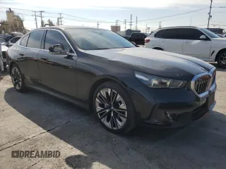 2024 BMW 5 Series 530i with VIN WBA43FJ09RCS15203, listed as a Copart auction lot 42549495 with 22,920 mi miles and Salvage title. Bid and sale history available at DreamBid. Image 4.