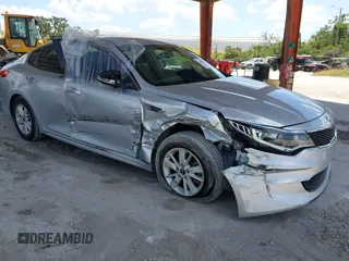 2016 Kia Optima LX z VIN 5XXGT4L39GG093127, wystawiony jako IAAI lot #42180887 z przebiegiem 171 014 mil mil oraz . Historia ofert i sprzedaży dostępna na DreamBid. Obrazek 1.