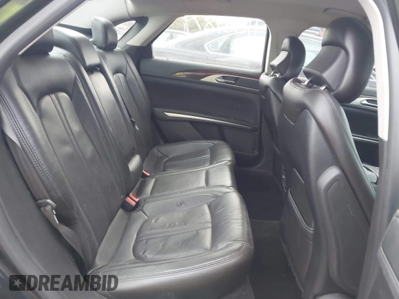 2014 Lincoln MKZ with VIN 3LN6L2G90ER832698, listed as a IAAI auction lot 41887879 with 141,798 mi miles and . Bid and sale history available at DreamBid. Image 8.
