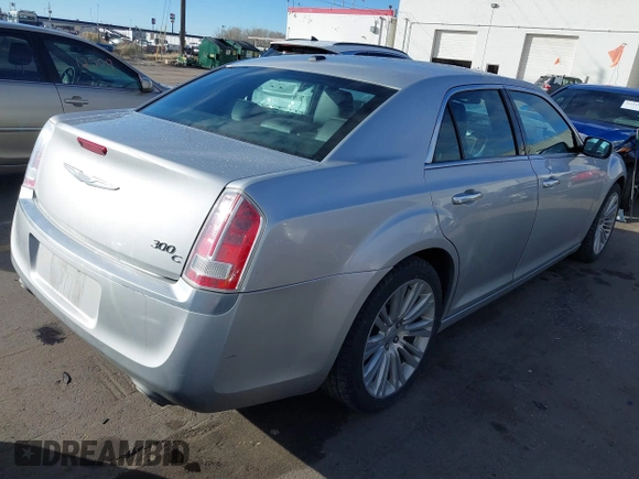 2012 Chrysler 300 C Luxury Series with VIN 2C3CCAPT9CH229047, listed as a IAAI auction lot 41219651 with 79,184 mi miles and . Bid and sale history available at carsss.com. Image 4.