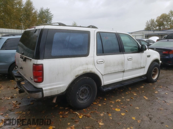 1997 Ford Expedition XLT z VIN 1FMEU17L6VLA61113, wystawiony jako Copart lot #73465703 z przebiegiem 184 878 mil mil oraz Czysty tytuł • Clean title. Historia ofert i sprzedaży dostępna na DreamBid. Obrazek 3.