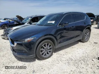 2018 Mazda CX-5 Grand Touring with VIN JM3KFBDM8J0474819, listed as a Copart auction lot 48580545 with 76,917 mi miles and Salvage Title. Bid and sale history available at DreamBid. Image 1.