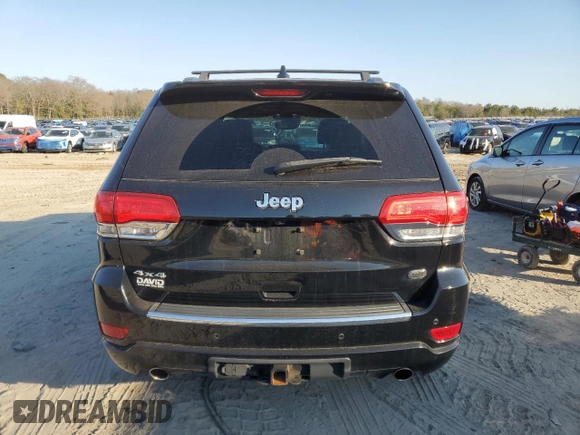 2017 Jeep Grand Cherokee Overland with VIN 1C4RJFCT5HC828780, listed as a Copart auction lot 46874965 with 90,269 mi miles and Salvage Title. Bid and sale history available at carsss.com. Image 6.