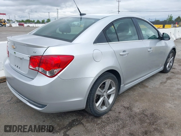 2012 Chevrolet Cruze LT w/2LT with VIN 1G1PG5SC4C7284915, listed as a IAAI auction lot 42064590 with 143,418 mi miles. Bid and sale history available at carsss.com. Image 4.