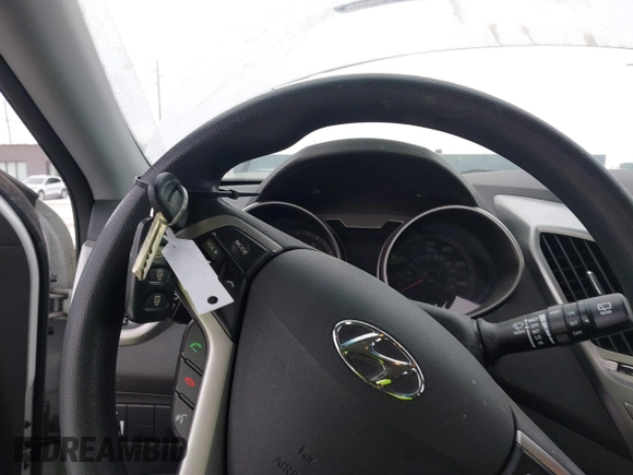 2013 Hyundai Veloster w/Black Int with VIN KMHTC6AD9DU171722, listed as a IAAI auction lot 41617721 with 115,791 mi miles and . Bid and sale history available at DreamBid. Image 11.