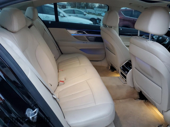 2018 BMW 7 Series 740i xDrive with VIN WBA7E4C50JGV23975, listed as a Copart auction lot 82354264 with 63,657 mi miles and Salvage Title. Bid and sale history available at carsss.com. Image 10.