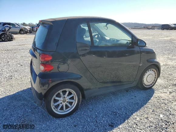 2013 Smart fortwo Pure with VIN WMEEJ3BA1DK666323, listed as a Copart auction lot 87106934 with 92,313 mi miles and Clean Title. Bid and sale history available at carsss.com. Image 3.