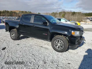 2022 GMC Canyon 4WD AT4 w/Cloth with VIN 1GTG6FEN2N1240091, listed as a Copart auction lot 85764964 with 25,881 mi miles and Salvage Title. Bid and sale history available at carsss.com. Image 4.