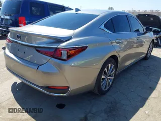2021 Lexus ES 300h with VIN 58ACA1C1XMU007576, listed as a IAAI auction lot 42302934 with 24,614 mi miles and . Bid and sale history available at DreamBid. Image 4.