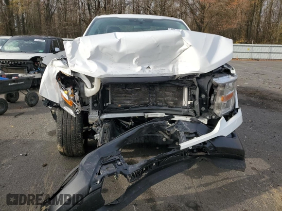 2022 Ford F-150 XL with VIN 1FTMF1E53NKE45810, listed as a Copart auction lot 82025684 with 75,442 mi miles and Salvage Title. Bid and sale history available at DreamBid. Image 5.