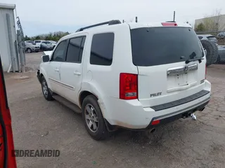 2009 Honda Pilot Touring with VIN 5FNYF48929B032510, listed as a IAAI auction lot 41945923 with 236,256 mi miles and . Bid and sale history available at carsss.com. Image 3.