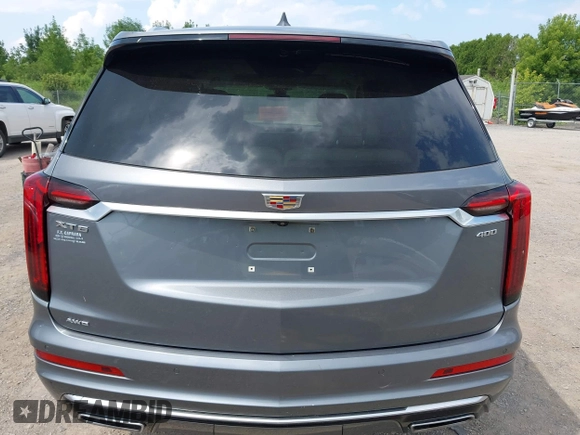 2021 Cadillac XT6 Premium Luxury with VIN 1GYKPDRS9MZ118642, listed as a IAAI auction lot 42664965 with 65,566 mi miles and . Bid and sale history available at DreamBid. Image 16.