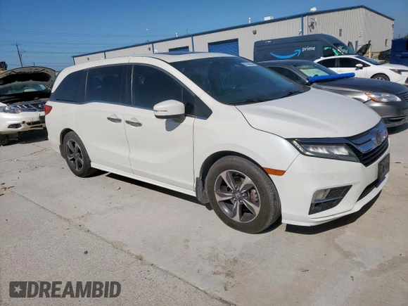 2018 Honda Odyssey Touring с VIN 5FNRL6H8XJB042111, выставлен на аукционе Copart как лот 52360005 с пробегом 126 835 миль миль и Чистый • Clean title. История ставок и продаж доступна на DreamBid. Изображение 4.
