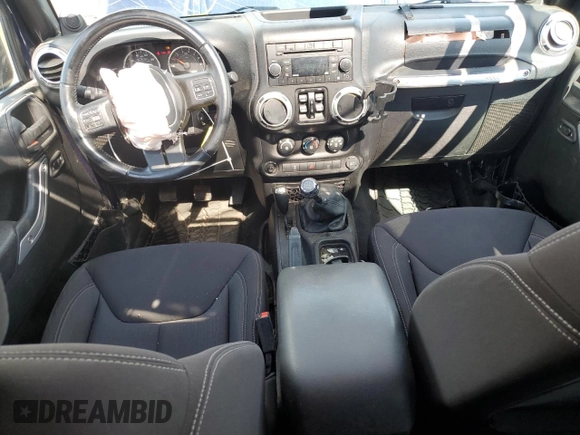 2013 Jeep Wrangler Unlimited Rubicon with VIN 1C4BJWFG5DL572795, listed as a Copart auction lot 62132425 with 149,695 mi miles and Salvage title. Bid and sale history available at DreamBid. Image 8.