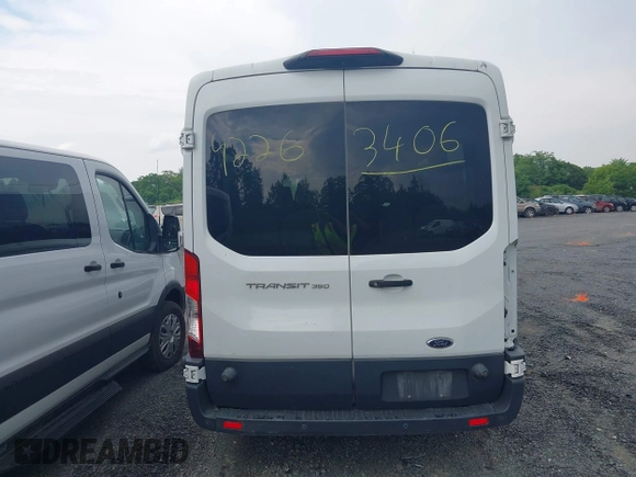 2018 Ford Transit Passenger XL with VIN 1FBAX2CMXJKB46104, listed as a IAAI auction lot 42263406 with Not provided miles and . Bid and sale history available at DreamBid. Image 16.