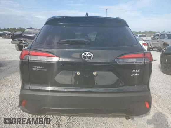 2024 Toyota Corolla Cross XLE with VIN 7MUEAABG2RV108218, listed as a Copart auction lot 54433915 with 7,091 mi miles and Salvage title. Bid and sale history available at DreamBid. Image 6.