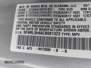 2012 Honda Odyssey EX-L with VIN 5FNRL5H66CB081323, listed as a IAAI auction lot 42465110 with 266,934 mi miles and . Bid and sale history available at DreamBid. Image 9.