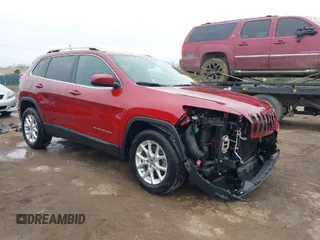 2014 Jeep Cherokee Latitude z VIN 1C4PJMCS4EW127709, wystawiony jako IAAI lot #42002110 z przebiegiem 51 574 mil mil oraz . Historia ofert i sprzedaży dostępna na DreamBid. Obrazek 1.