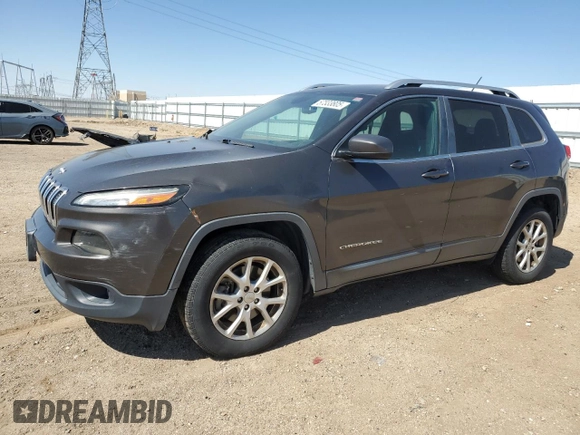 2015 Jeep Cherokee Latitude z VIN 1C4PJMCB2FW734385, wystawiony jako Copart lot #57333805 z przebiegiem 121 249 mil mil oraz Szkoda całkowita • Salvage title. Historia ofert i sprzedaży dostępna na DreamBid. Obrazek 1.