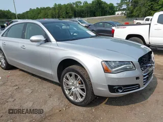 2013 Audi A8 3.0L z VIN WAURGAFD9DN007120, wystawiony jako IAAI lot #42384512 z przebiegiem 195 319 mil mil oraz . Historia ofert i sprzedaży dostępna na DreamBid. Obrazek 1.