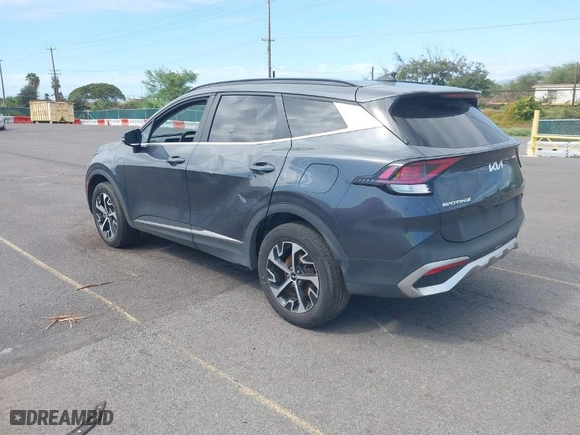 2023 Kia Sportage Hybrid EX with VIN KNDPVCAG5P7020209, listed as a IAAI auction lot 41409698 with 67,953 mi miles. Bid and sale history available at carsss.com. Image 3.